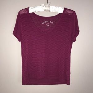 Dark pink, striped shirt